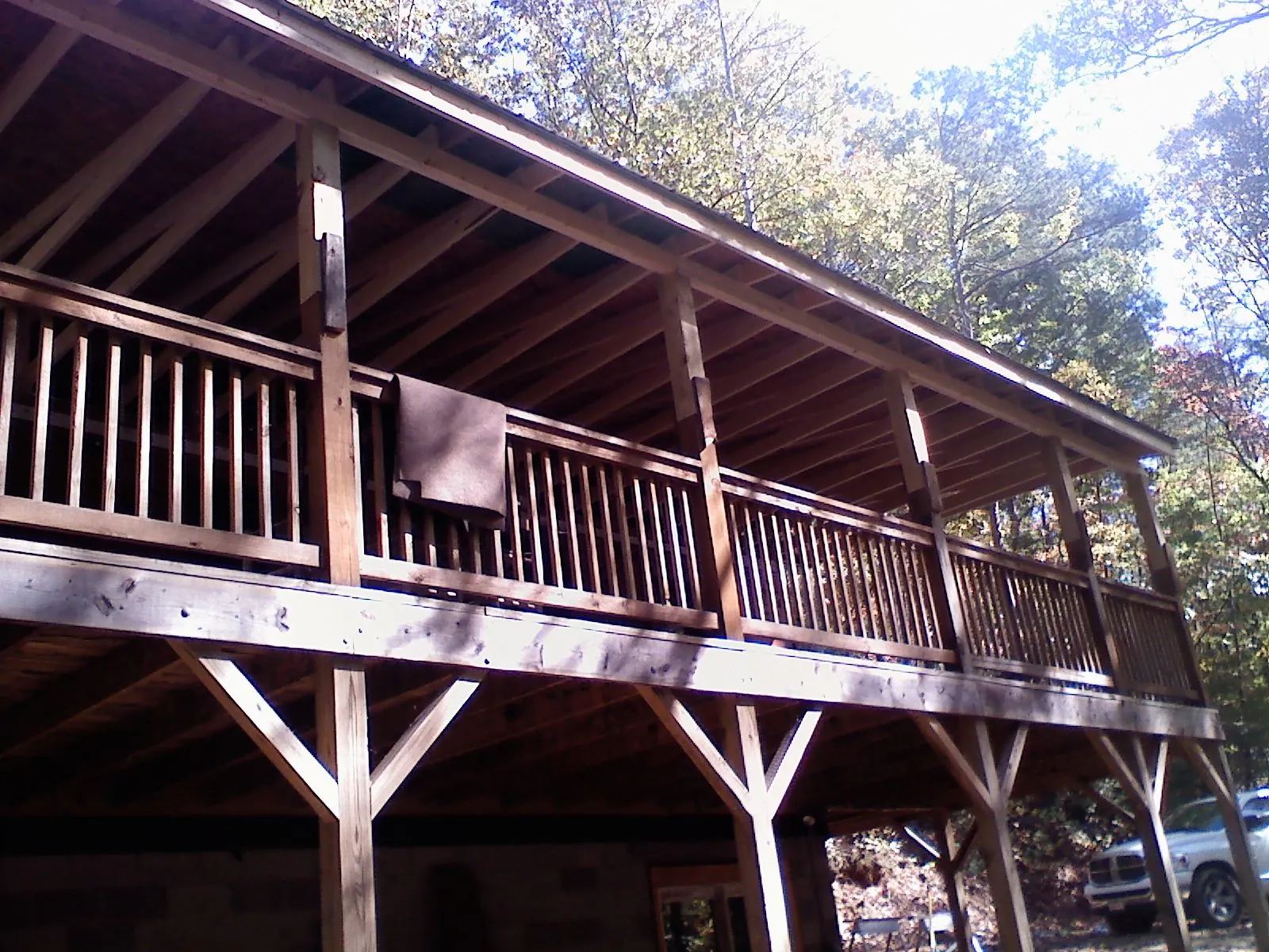 Timber framing under a new elevated porch and deck — Roof Leak Repair in Montverde by Roofing Brothers